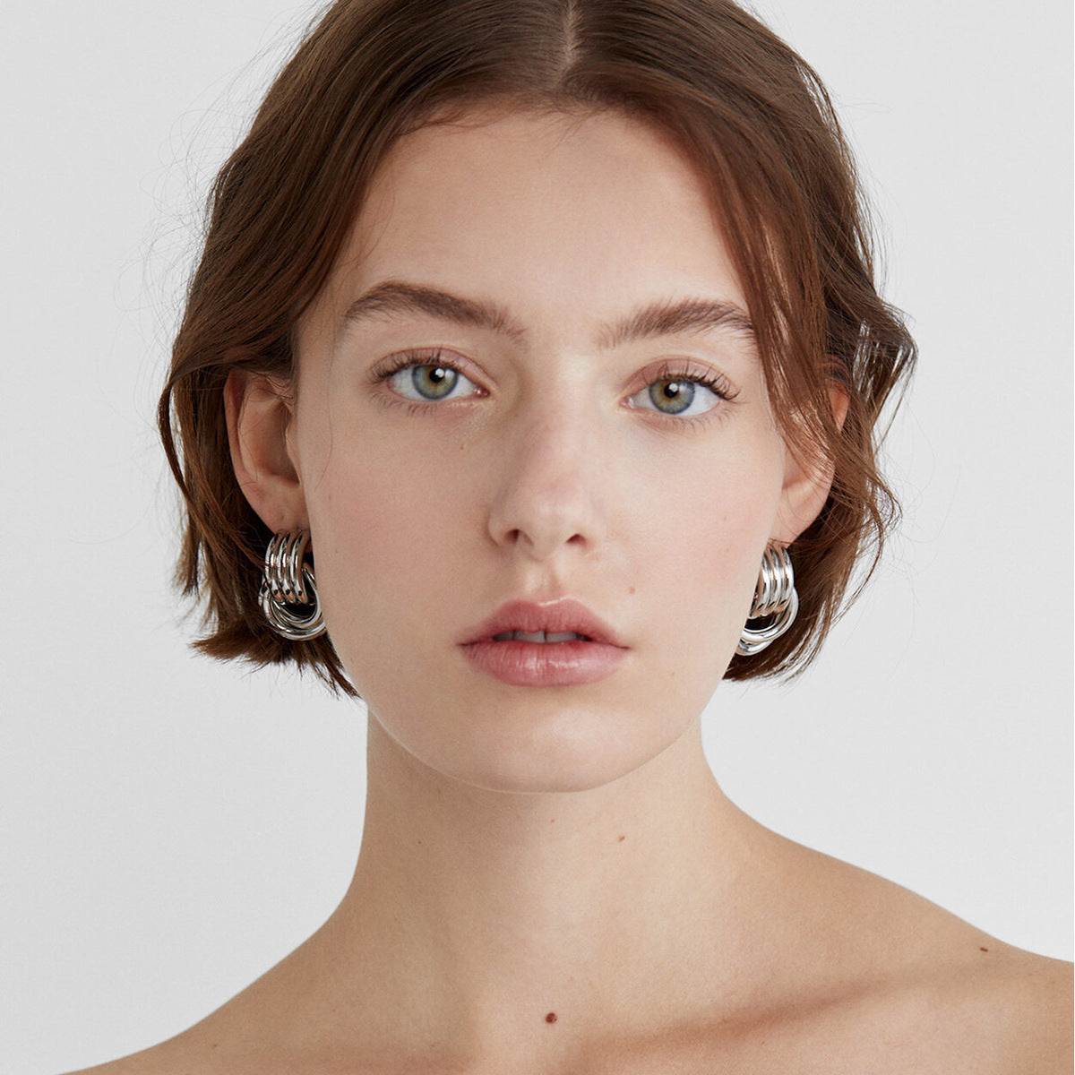 High-end Gold and Silver Color Block Stainless Steel Earrings for Women 8k Gold Spiral Wrapped Simple Titanium Steel Hoop Earrings