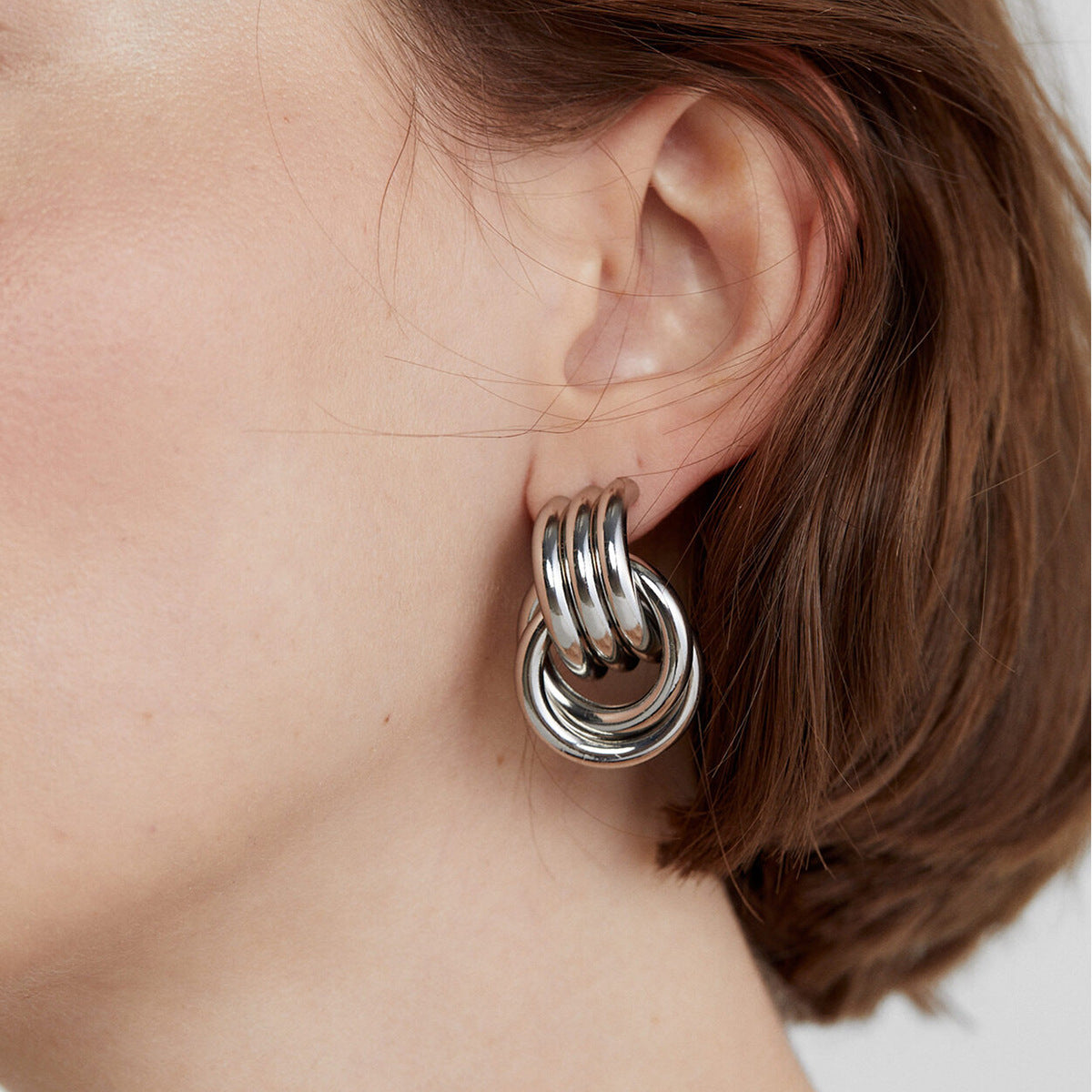 High-end Gold and Silver Color Block Stainless Steel Earrings for Women 8k Gold Spiral Wrapped Simple Titanium Steel Hoop Earrings
