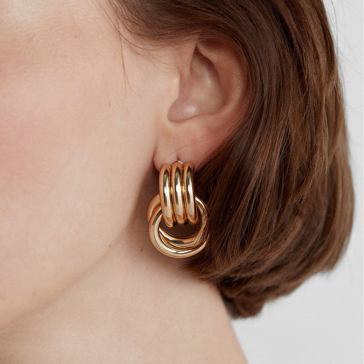 High-end Gold and Silver Color Block Stainless Steel Earrings for Women 8k Gold Spiral Wrapped Simple Titanium Steel Hoop Earrings